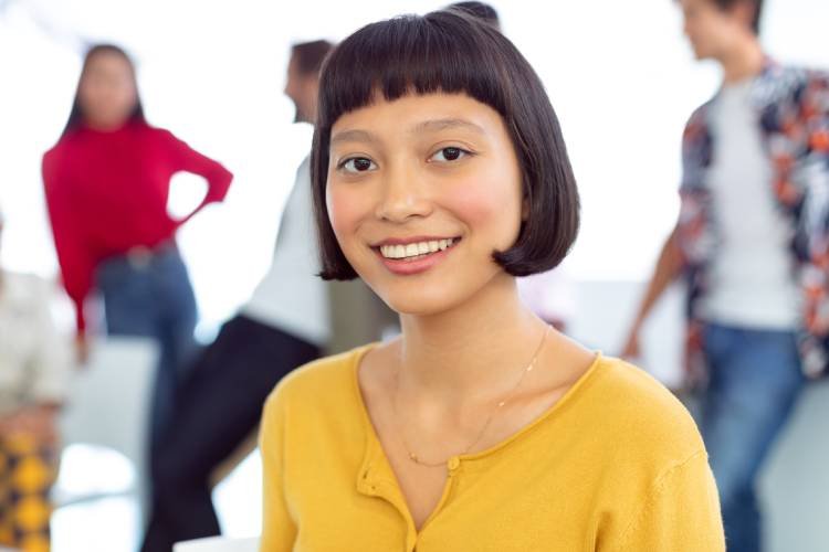 front-view-of-happy-young-asian-businesswoman-look-2025-04-04-08-28-03-utc