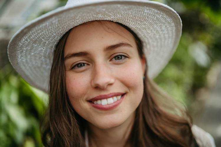 portrait-of-young-woman-in-botanical-garden-2024-10-18-08-31-05-utc