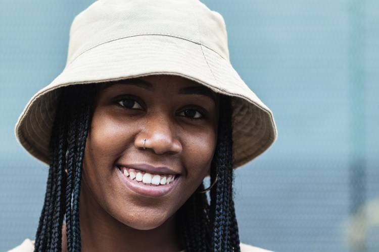 young-black-woman-in-hat-2025-04-04-05-06-04-utc